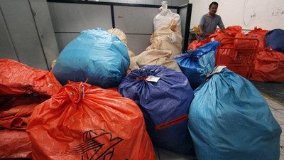 img-title KPPU 'Cium' Persaingan Usaha Tak Sehat Jasa Pengiriman