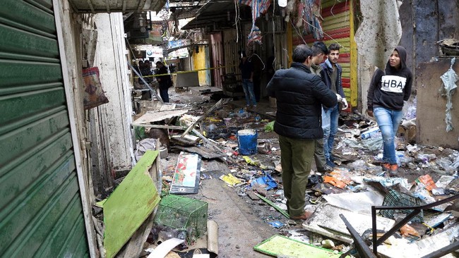 Dua bom meledak di area pasar di pusat Kota Baghdad, Irak menewaskan setidaknya 18 orang dan melukai sekitar 53 lainnya.