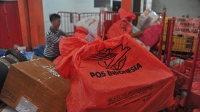 Jasa Gadai Online Pinjam.co.id Gandeng PT Pos Indonesia