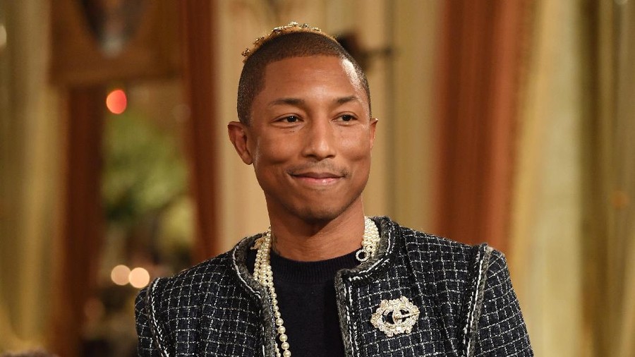 Pharrell Williams PARIS, FRANCE - DECEMBER 06: Pharell Williams walks the runway during