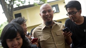 Kelar Diperiksa, Ahmad Dhani Menebeng Mobil Polisi