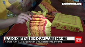 Uang Kertas Kim Cua Laris Manis