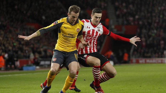Arsenal berpesta lima gol ke gawang Southampton untuk meraih tiket menuju fase 16 besar Piala FA musim ini. Dua gol dari Welbeck, dan hattrick dari Walcott.