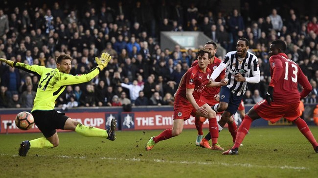 Langkah Leicester City kandas di babak kelima Piala FA setelah kalah secara dramatis dari klub Championship Inggris Millwall.