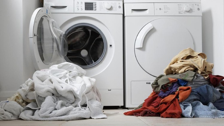 one coloured one white pile of washing