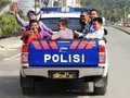 Aksi Susi Naik Mobil Bak Terbuka Bikin Netizen Terperangah