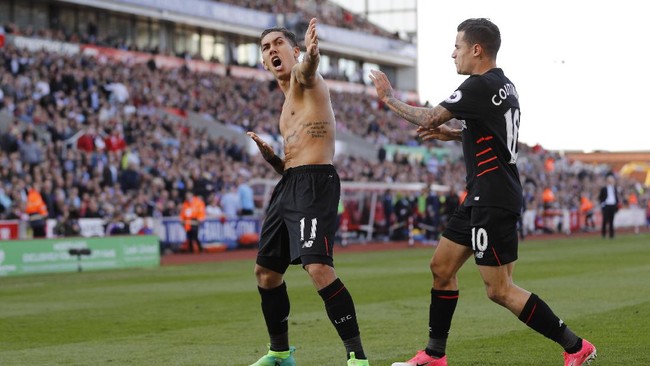 Liverpool berhasil meraih tiga poin berharga di markas Stoke City, Stadion Britannia lewat kemenangan 2-1 atas tuan rumah.