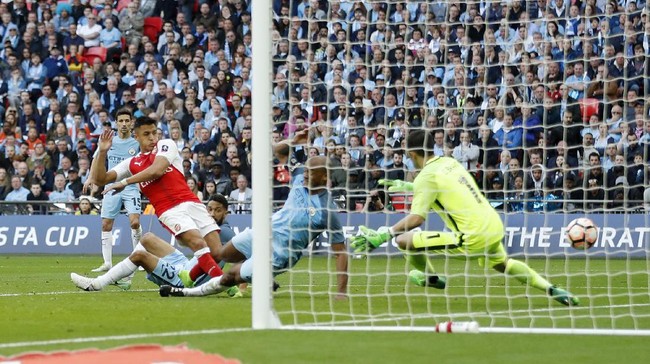 Arsenal melaju ke final Piala FA setelah menekuk Manchester City 2-1 pada babak tambahan waktu. The Gunners sudah ditunggu Chelsea di final.
