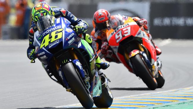 Rossi Remehkan Marquez Jelang MotoGP 2021 Valentino Rossi menganggap Marc Marquez bukan lawan terkuat yang pernah dihadapi jelang MotoGP 2021.
