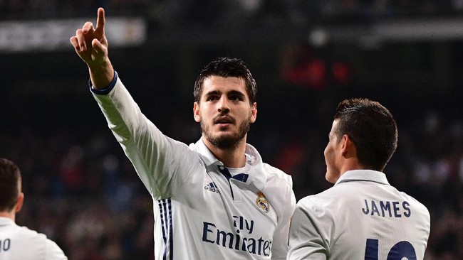 Penyerang Real Madrid Alvaro Morata mengatakan tak ingin berpisah dengan James Rodriguez di Real Madrid. Ia masih ingin bermain bersama Rodriguez.