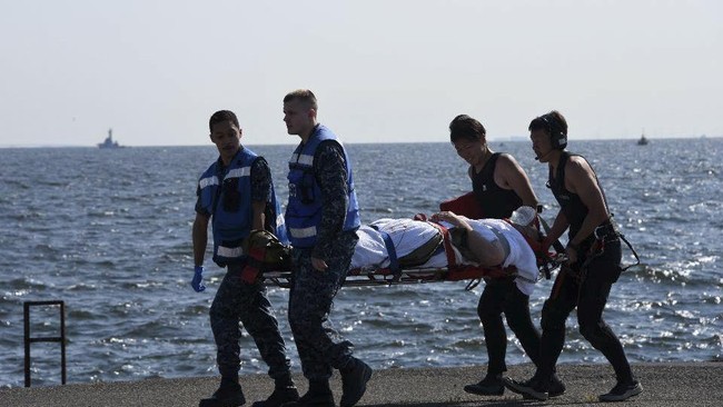 Tujuh pelaut AS yang dinyatakan hilang dalam insiden tabrakan kapal perang AS dan kapal kontainer Filipina di Laut Jepang, ditemukan tewas.