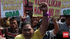 Sopir GrabCar Turun ke Jalan Tuntut Keadilan