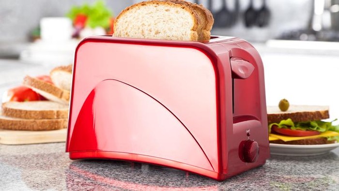 Red Toaster on Modern Kitchen Counter Top.  MORE RED HOUSEHOLD APPLIANCES ON MY PORTFOLIO