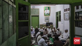 Di Balik Bingkai Foto Rizieq Shihab