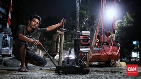 FOTO: Mereka yang Dipandang Sebelah Mata di Pinggir Jalan