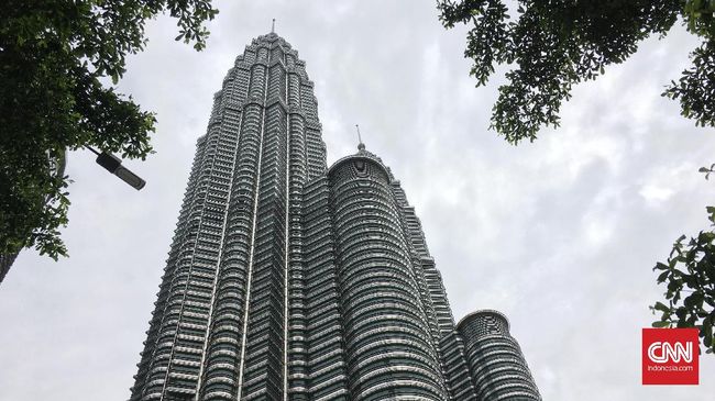 Menjelajah Malaysia atau Kuala Lumpur sebagai alternatif liburan akhir tahun semakin mudah dan murah dengan menggunakan Grab.