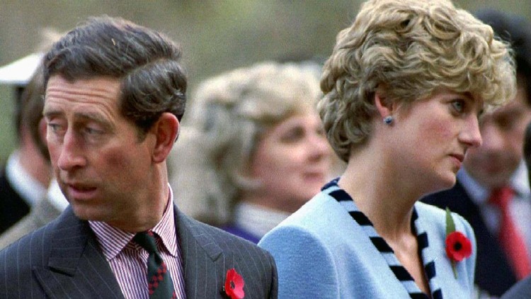FILE PHOTO: Britain's Princess Diana frolicks in the surf during a beach outing on the Caribbean island of St Kitts, January 4, 1993. REUTERS/File Photo