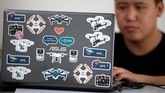 FOTO: Sekolah Khusus Pilot Drone Demi Sebuah Lisensi Pemerintah China serius mengatur penerbangan drone dengan membuat sekolah khusus pilot drone di Beijing.