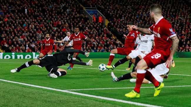 Liverpool dan Sevilla harus puas berbagi angka setelah duel keduanya di Anfield berakhir dengan skor 2-2.