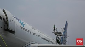 Beli Tiket Garuda Bisa Pakai Mata Uang Asing