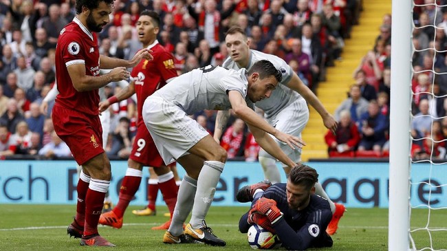 Manchester United vs Liverpool hanya berjarak dua poin di klasemen sementara Liga Inggris. Laga di Old Trafford bisa jadi penentu predikat runner-up.