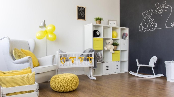 Unisex space- cosy baby room and yellow decorations
