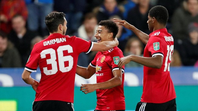 Manchester United menang 2-0 atas Swansea di babak 16 besar Piala Liga. Kedua gol MU dicetak Jesse Lingard.