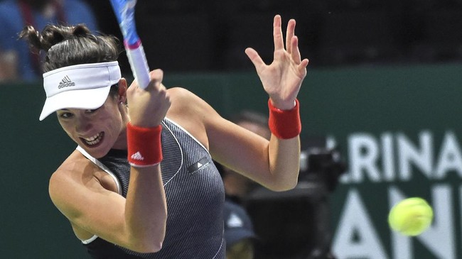 Juara bertahan Garbine Muguruza tersingkir di babak kedua Wimbledon 2018 usai kalah dari petenis nonunggulan asal Belgia, Alison Van Uytvanck, 7-5, 2-6, 1-6.