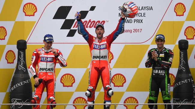 Kemenangan di MotoGP Malaysia membuat Andrea Dovizioso memangkas jarak dengan Marc Marquez di puncak klasemen sementara MotoGP 2017.