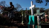 FOTO: Menghargai yang Telah Pergi dalam Hari Orang Mati Day of the Dead atau Hari Orang Mati bagi masyarakat Amerika Tengah bukan cuma perayaan mirip Halloween, namun juga penghormatan kepada Dewa Kematian.