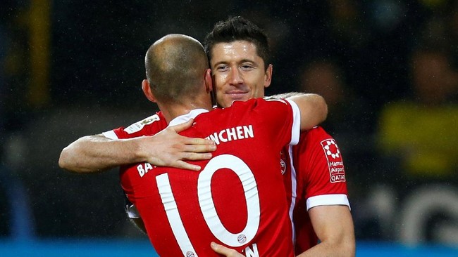Bayern Munich berhasil mengalahkan Borussia Dortmund dengan skor 3-1 dalam Der Klassiker di Signal Iduna Park.