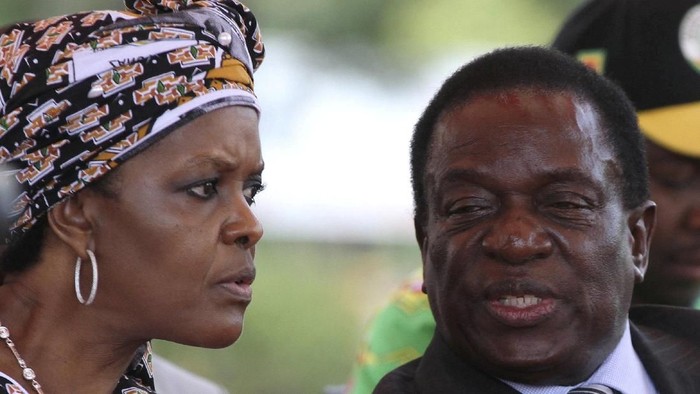 FILE PHOTO: President Robert Mugabe's wife Grace Mubage and vice-President Emmerson Mnangagwa attend a gathering of the ZANU-PF party's top decision-making body, the Politburo, in the capital Harare, Zimbabwe, February 10, 2016. REUTERS/Philimon Bulawayo/File Photo