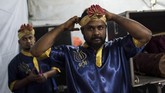 FOTO: Musik India di Atas Panggung Malaysia Ensambel 'urumee melam' yang dahulu merupakan musik untuk kelas pekerja India, kini dimainkan di festival-festival Hindu di Malaysia.