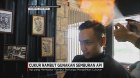 Pangkas Rambut Unik: Dengan Semburan Api!