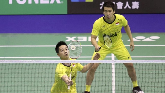 Kevin Sanjaya/Marcus Fernaldi Gideon berhasil memenangkan laga perdana BWF Super Series Finals saat melawan Mads Conrad-Petersen/Mads Pieler Kolding.