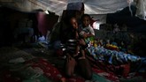 FOTO: Dilema Brasil Mengatasi Tunawisma Tunawisma di Rio de Janeiro menjadi dilema bagi Brasil, meski pemerintah telah membangun penampungan bagi mereka. (REUTERS/Pilar Olivares)