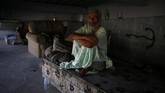 FOTO: Dilema Brasil Mengatasi Tunawisma Tunawisma di Rio de Janeiro menjadi dilema bagi Brasil, meski pemerintah telah membangun penampungan bagi mereka. (REUTERS/Pilar Olivares)