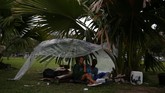 FOTO: Dilema Brasil Mengatasi Tunawisma Tunawisma di Rio de Janeiro menjadi dilema bagi Brasil, meski pemerintah telah membangun penampungan bagi mereka. (REUTERS/Pilar Olivares)