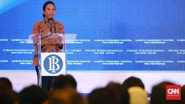 Menteri BUMN Rini Soemarno meminta kepada OJK tak segan mencabut izin bank-bank yang tak mau bergabung dalam sistem Gerbang Pembayaran Nasional (GPN).