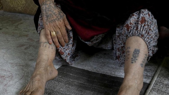 FOTO: Memenangkan Hati dengan Tato dari ASI dan Jelaga
