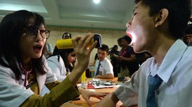 Kemenkes Sebut Tiup Terompet Berpotensi Tularkan Difteri