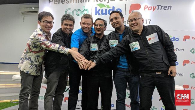 Menakar Buah Kerja Sama Grab - PayTren Kerjasama antara Grab dan PayTren disebut untuk menjangkau lebih banyak pendaftaran calon pengemudi.