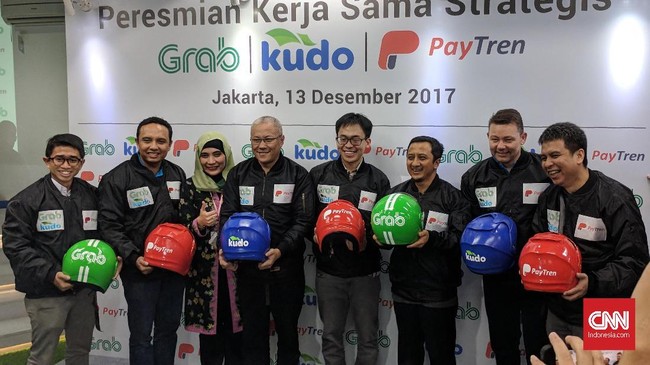 Sambil menunggu restu dari Bank Indonesia, Grab melakukan sejumlah langkah kerjasama dengan fintech, PayTren.