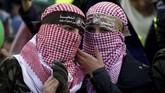 FOTO: Perayaan 30 Tahun Hamas di Tengah Kisruh Yerusalem Hamas Palestina merayakan 30 tahun pendirian gerakan Islamis tersebut di Gaza, sementara situasi memanas karena pengakuan Yerusalem sebagai ibu kota Israel.