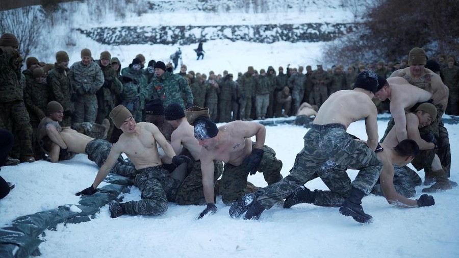 South Korean and U.S. Marines take part in a winter military drill in Pyeongchang, South Korea, December 19, 2017. REUTERS/Kim Hong-Ji