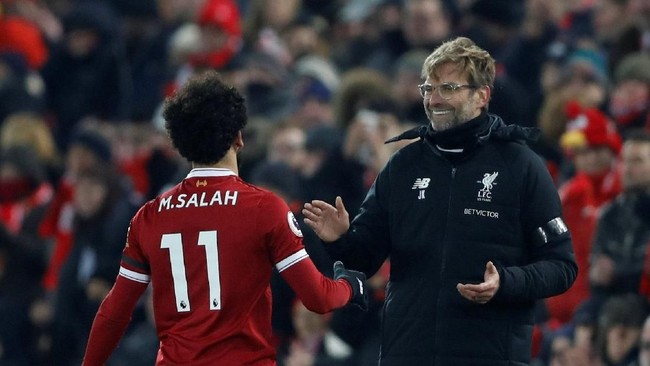 Manajer Liverpool, Juergen Klopp, tengah menikmati kemenangan bersajarah timnya atas Manchester City. Liverpool mengalahkan City, 4-3, di Anfield.