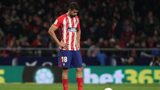 Sevilla yang bertamu ke markas Atletico Madrid pada leg pertama perempat final Copa del Rey mengemas kemenangan 2-1.