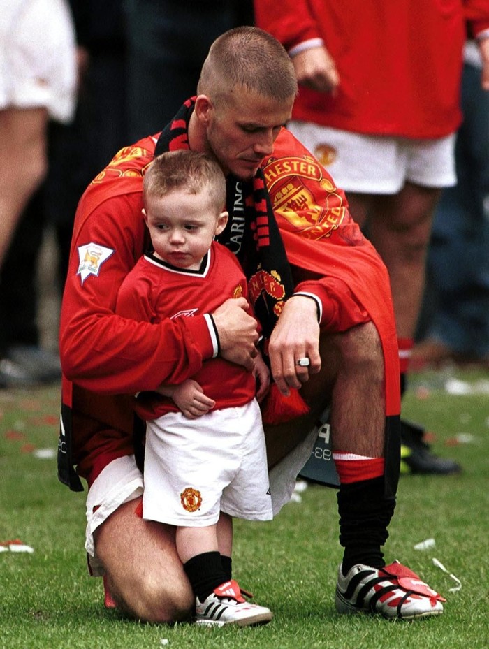 5 May 2001: David Beckham with Brooklyn aftre the FA Carling Premiership match between Manchester United and Derby County at Old Trafford, Manchester. Mandatory Credit: Stu Forster/ALLSPORT