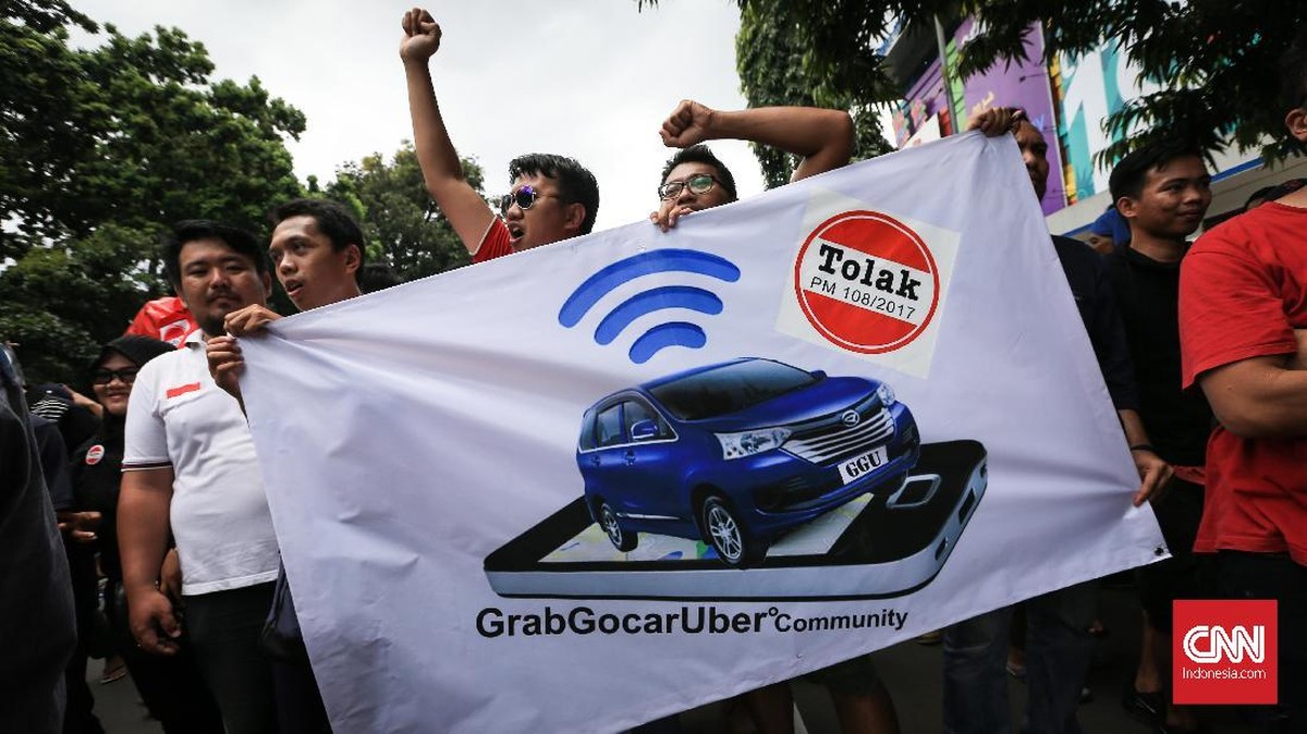 FOTO: Sopir Taksi Online Kembali Tolak Aturan Pemerintah