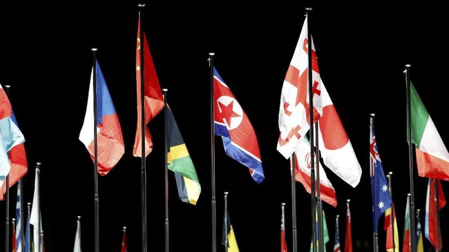 Bendera nasional Korea Utara berkibar di Korea Selatan menjelang pembukaan Olimpiade Musim Dingin di Pyeongchang pada 9 Februari mendatang.